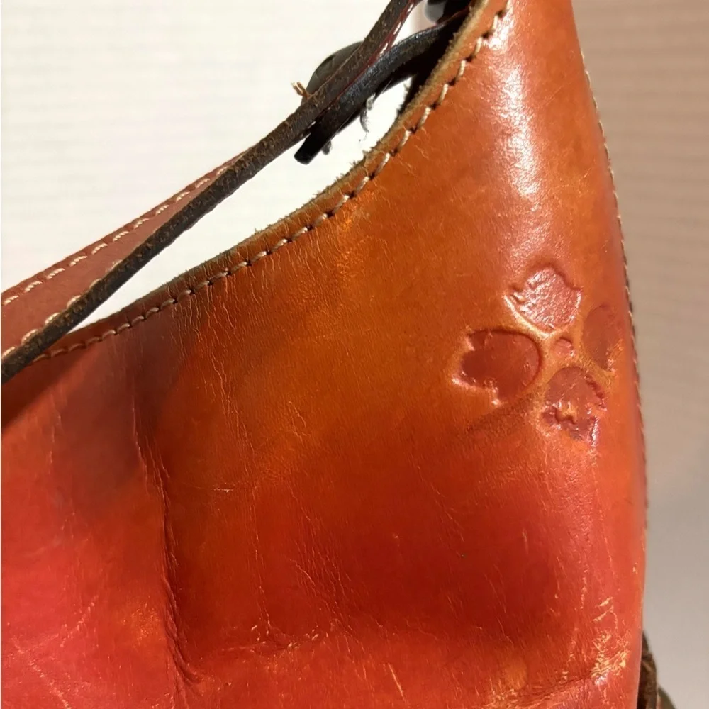 Patricia Nash Elegant Orange Leather Shoulder Bag